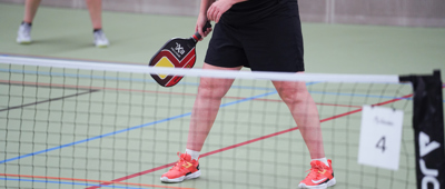 Pickleball Net En Speler